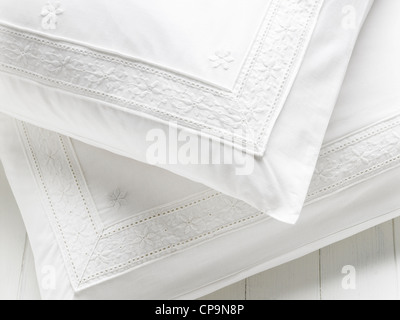 white embroidered pillow detail Stock Photo