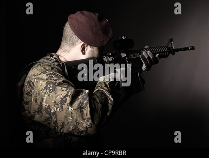 caucasian soldier portrait with rifle Stock Photo