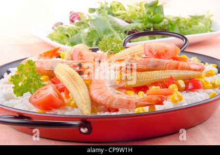 spanish vegetable paella with bell pepper, babycorn and tomato Stock Photo