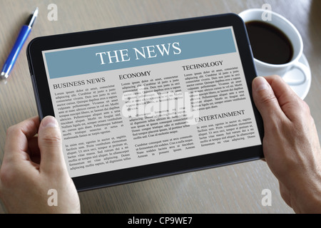 Digital news on tablet computer screen Stock Photo - Alamy