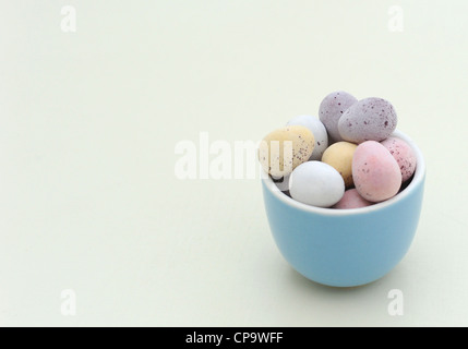 Cadburys Easter Mini Eggs in a Blue Egg Cup Stock Photo