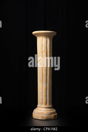Classical column on black background. Clipping path. Stock Photo