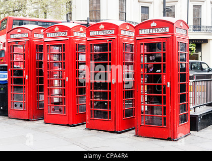 A row of red British telephone kiosks, London, England. Stock Photo