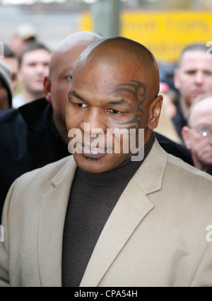 Mike Tyson pays respects to Johnny Owen when he visits Merthyr Tydfil, South Wales, 2009
