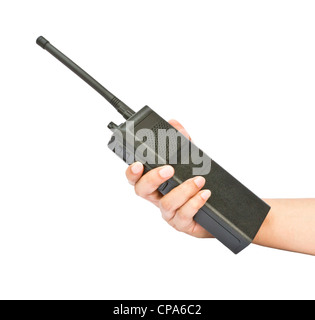 A walkie-talkie in hand isolated on white background conceptaul Stock Photo