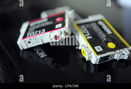 Spent or used Epson printer ink cartridges for use with a computer Stock Photo