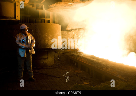 A worker at the new blast furnace 8 at the ThyssenKrupp Steel AG, Duisburg, Germany