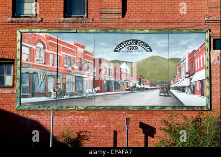 Colorful hand painted mural on side of an old building in historic downtown district, small mountain town of Salida, Colorado Stock Photo