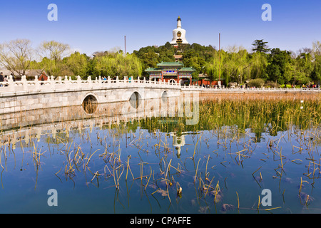 Beihai Park and the White Pagoda, Beijing, on a bright spring day. Stock Photo