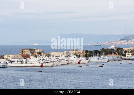 Messina, Sicily, Italy - Italian customs and coastguard vessels lined up in the harbour. High speed cruisers ready for action Stock Photo