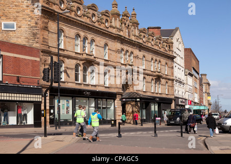 The Civic Centre, an old sandstone building in Barnsley, South Yorkshire, people walking by. Stock Photo