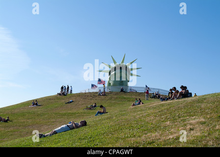 Statue of Liberty head on top of hill. Stock Photo