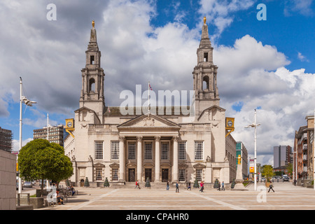 A view across Millenium Square to the Victorian facade of City Council on a sunny day in Leeds, West Yorkshire, England. Stock Photo