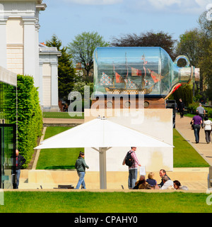 Yinka Shonibare artwork Nelson's Victory ship in bottle by British artist at National Maritime Museum beside cafe in Greenwich Park London England UK Stock Photo