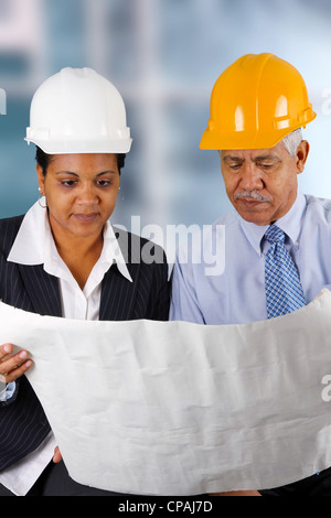 Construction workers working on a job together Stock Photo