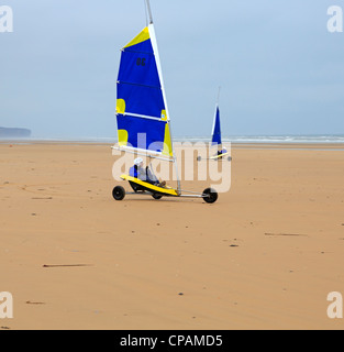 Sand Yachting on Omaha Beach in Normandy. The 5 mile long stretch of sand beach is ideal for land yachts. Stock Photo