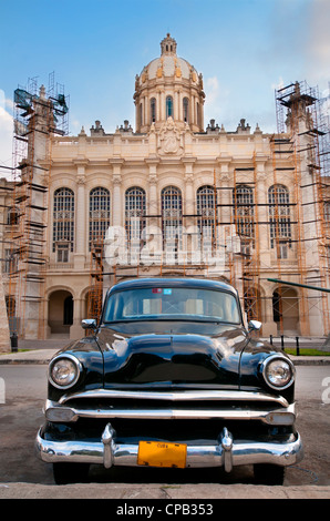 Old american car parked in front of presidential palace, now revolution museum in Havana, Cuba. Stock Photo