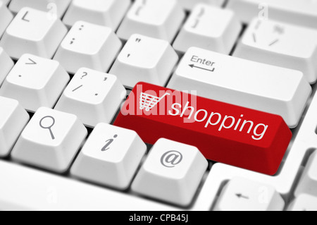 Shopping cart icon button on the key of a computer keyboard Stock Photo