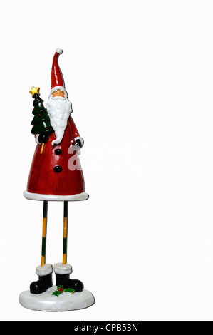 Father Christmas statue against a white background. Stock Photo