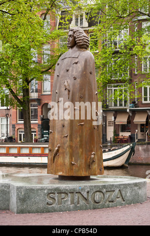 AMSTERDAM, NETHERLANDS - MAY 08, 2012:  Bronze statue of Baruch de Spinoza in Amsterdam Stock Photo