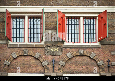 AMSTERDAM, NETHERLANDS - MAY 08, 2012:  Window with shutters on traditional building on Jodenbreestraat in the Oude Zijde area Stock Photo