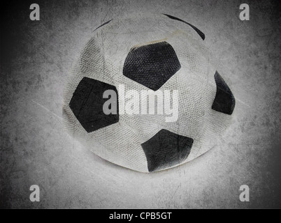 old deflated soccer ball Stock Photo
