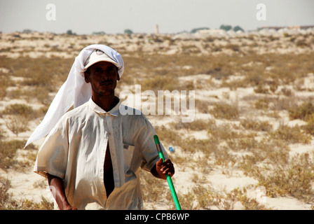 Arabic herdsman in Dubai U A E Stock Photo