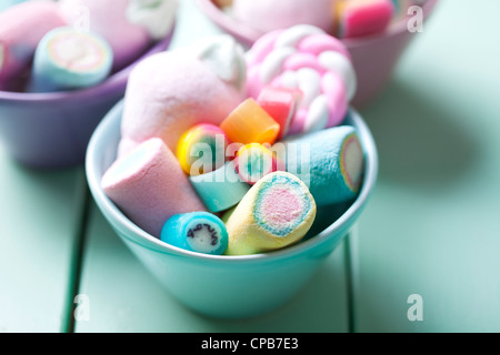 bowl full of colorful pastel marshmellows and rock candy Stock Photo