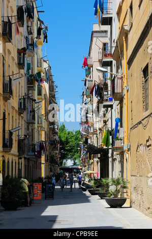 The narrow street in La Barceloneta, Barcelona, Spain. Stock Photo