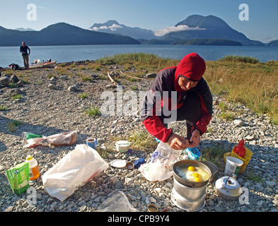 Camp cooking, Toba Inlet, BC, during a sea kayak expedition, Desolation Sound, British Columbia, Canada Stock Photo