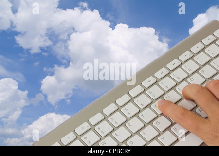 cloud computing concept - keyboard over cloudscape Stock Photo