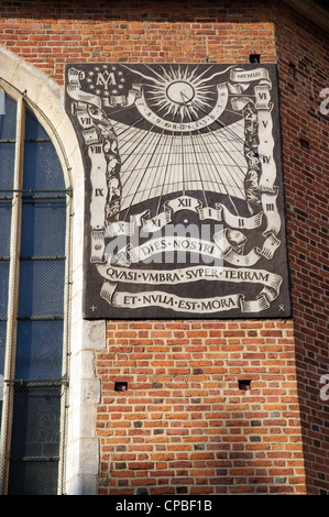 Sundial on the side wall of Mariacki Basilica, Krakow, Poland. Stock Photo