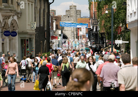 Giants in Canterbury High Street Kent England UK looking towards Westgate Towers Stock Photo