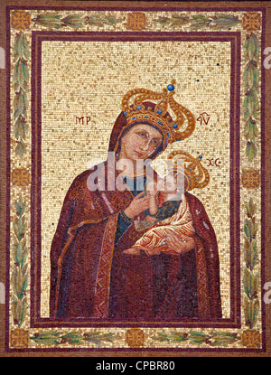 Rome,Italy, March 20, 2012: Virgin Mary mosaic from facade of house on Via del Porta Angelica. Stock Photo