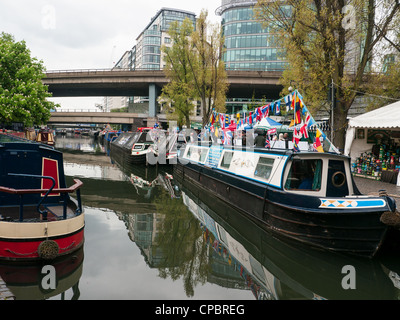 Houseboats and narrow boats at a Festival on the Grand Union Canal in Little Venice, Paddington, West London, UK Stock Photo