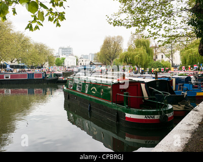 Rows of houseboats and narrow boats on the Grand Union Canal at a Festival in Little Venice, Paddington, West London Stock Photo