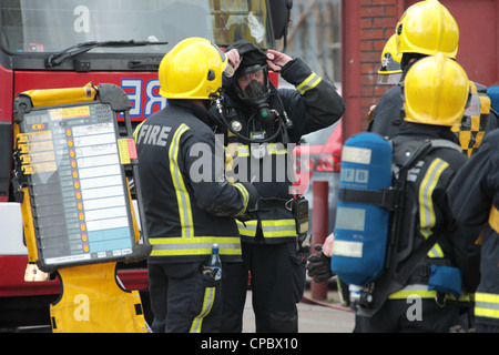 London Fire Brigade Firefighters at BA Control point during a fire in Dagenham East London Stock Photo