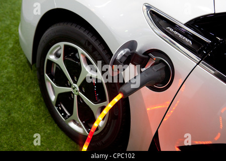 Vauxhall Ampera, Car of the year 2012 recharging at EcoVelocity the low carbon motor event at Excel in London Stock Photo