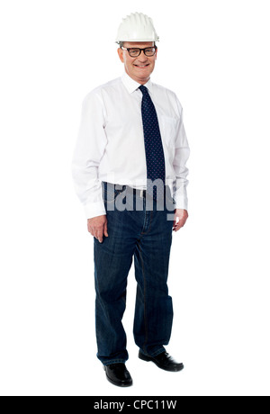 Full length view of senior architect posing in front of camera Stock Photo