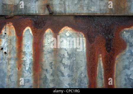 Streaks of rust on a metal baking sheet. Stock Photo
