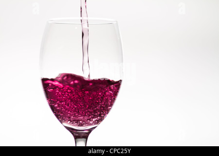 Glass of wine being filled Stock Photo