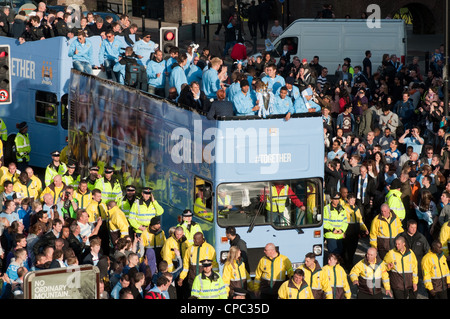 Manchester City FC Premier League Trophy Parade. 100,000 blues fans turn out to celebrate victory for their club. Stock Photo