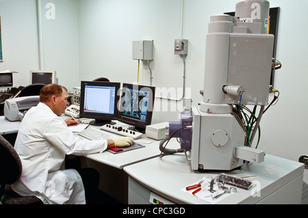 Researcher, Phillips FEI XL30 SFEG Scanning Electron Microscope. Stock Photo