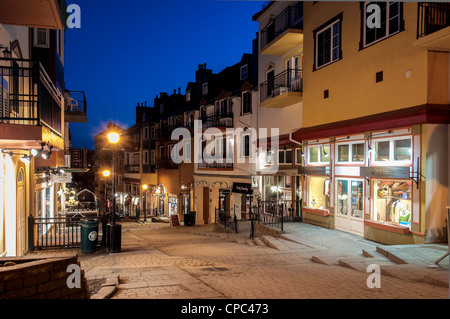 Rue des Remparts at dusk, Mont Tremblant base village, Quebec, Canada. Stock Photo