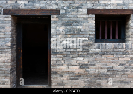 Ancient Chinese prison with wooden door and window which was built at qing dynasty. Stock Photo