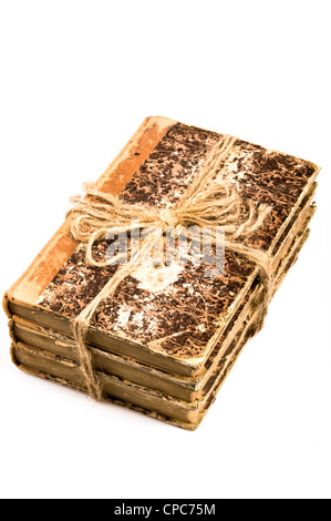 three old books stacked Stock Photo