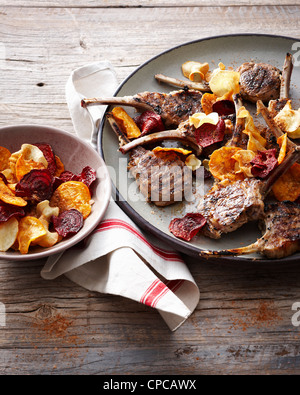 Plate of lamb cutlets with chips Stock Photo