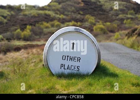 Whisky barrel signpost on the roadside 'Bunnahabhain Distillery 1/2 ...