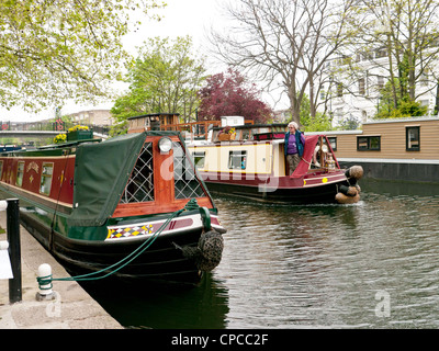 Houseboats and narrow boats in Little Venice, Paddington, West London, where the Grand Union Canal meets the Regent's Canal. Stock Photo