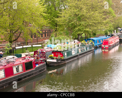 Houseboats and narrow boats in Little Venice, Paddington, West London, where the Grand Union Canal meets the Regent's Canal. Stock Photo